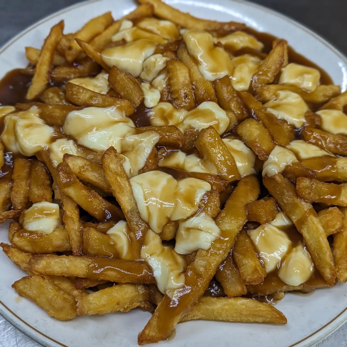 Crispy chicken wings with sauce at Time Out Pub Edmonton
